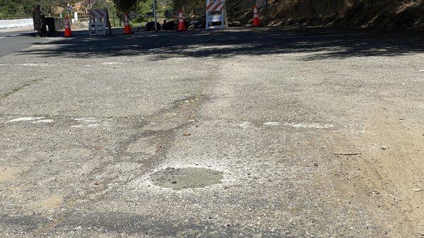 Stain on fire road where driver washed his chute