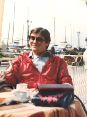 On the shores of Lake Garda in Italy, '80's, wearing a shell I bought again last year!