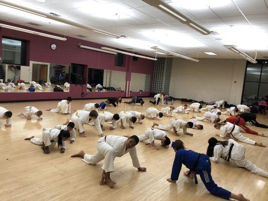 Stretching prior to working out.