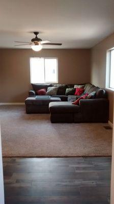 The new living room, showing both the installed carpet and the Marquis vinyl flooring.