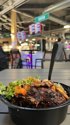 Seating area view of One Love Cafe's Jerk Chicken