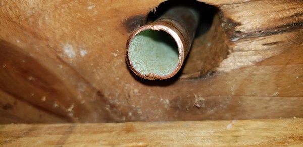 Corrosion on copper pipe causing numerous leaks from longtime use. Water levels at a ph level of 5.5.