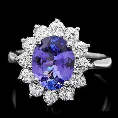 Vintage inspired tanzanite and diamond ring.