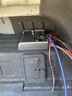 Amp bolted to the hybrid battery.