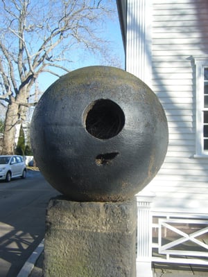 Cannon ball from the battle in front of a house