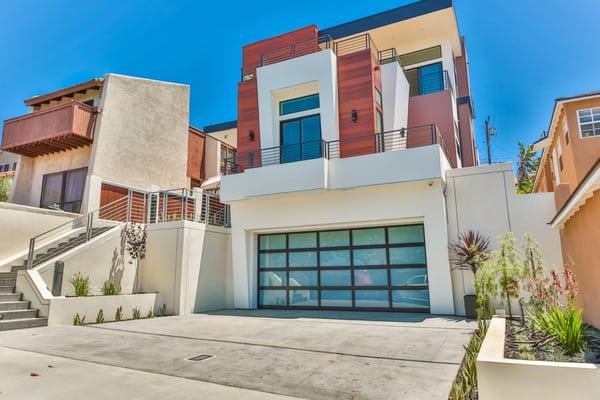 New Contemporary Custom Home For Sale!  Fabulous ocean views!  This home features 4 bedrooms, 3 full baths, 2 half baths, liv...