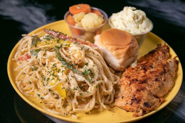 Grilled chicken breast pasta with your choice of spaghetti or alfredo sauce. Served with a roll and vegetables.