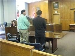 Jason R. Brogden stands with a client awaiting a NOT GUILTY verdict in Geneva County, Alabama in 2014.