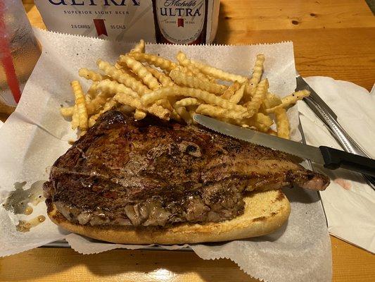 Ribeye steak sandwich with fries, tender and cooked perfectly.