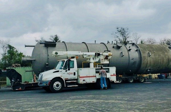 HiWire Bucket Trucks escorting a vessel