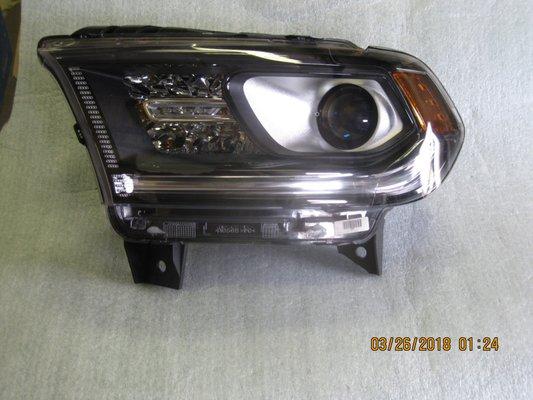 14-17 Dodge Durango TRH headlight OEM Halogen 125 dollars