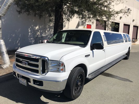 14 passengers Ford Excursion.