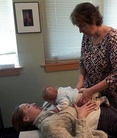 Newborn getting his first adjustment.