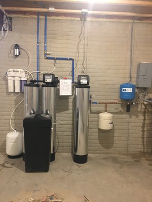 Complete whole home treatment system. Iron filter, twin tank softener, reverse osmosis system.