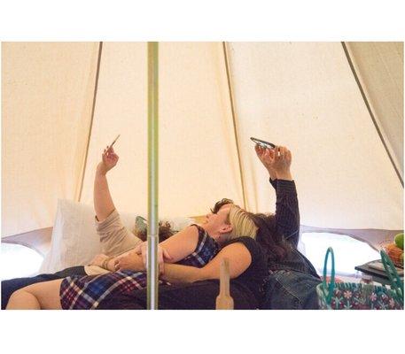 Selfies in the big bell tent. Our favorite silly fun. Pile up on the bed.