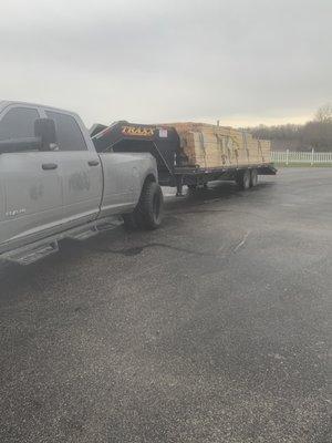 Hauling wood for framing for a new house from Hutto to Kyle, Texas