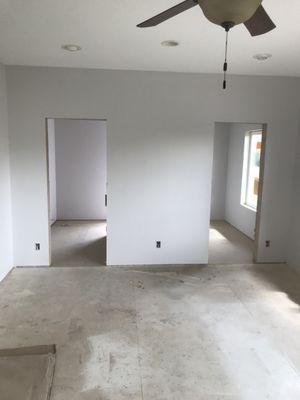 Client added a bathroom and closet addition to their home. We hung drywall, taped, textured and painted.