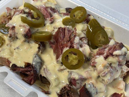 Nachos with smoked de-boned turkey necks.