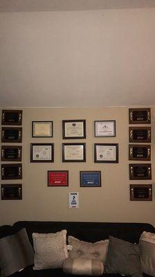 Our awards, licenses, and certifications. Only a few, we have walls full.