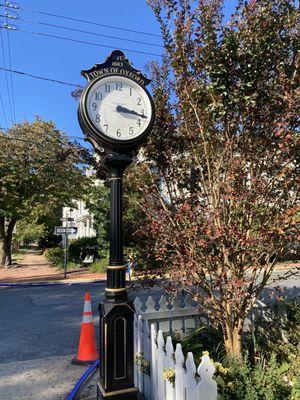 Clock by the museum and the museum's little garden