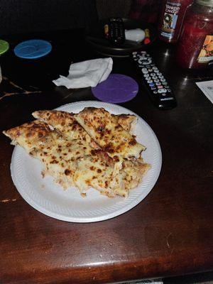 My plate 2 slices of pizza and a slice of the cheesy bread(already at 2 others)