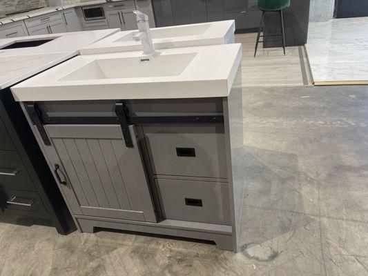 This is a 36"  Light grey barn style with a matte white basin top.