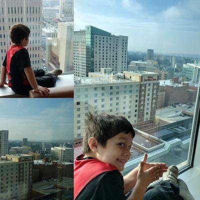 We're at the ASCE conference for my civil engineer husband in denver. Mayson is enjoying the view from our 16th story window.