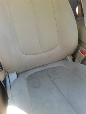 Kia Rondo seat before cleaning