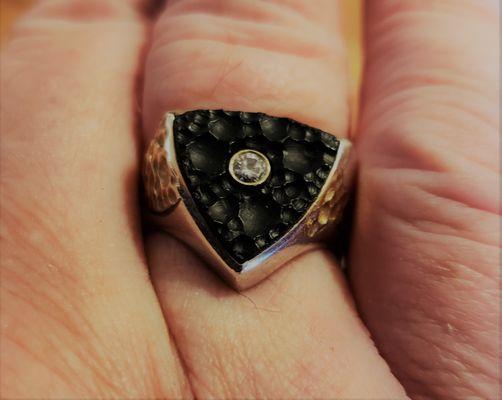 Jeff made an absolutely beautiful black onyx, gold and sliver ring with a beautiful diamond ring for me for my 60th birthday.  It not only f