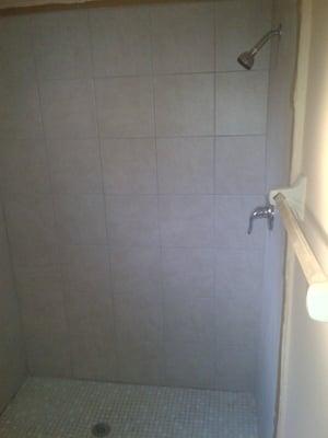 Rental property shower "After" side view