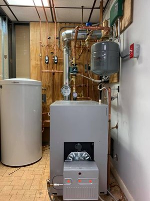 Viessmann Vitorond oil fired boiler with indirect storage tank.