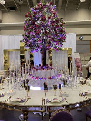 Rose Tree with a lovely Table, Chairs, and Place Setting