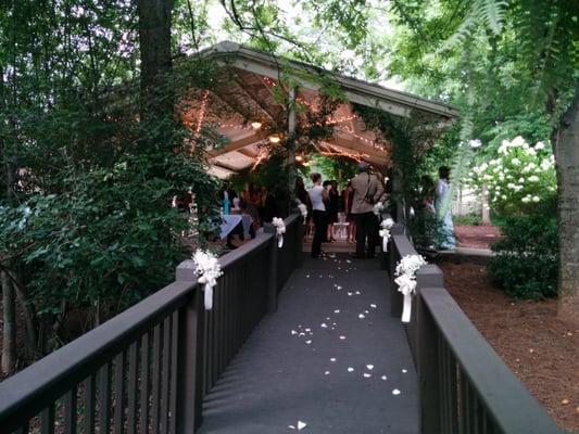 Gorgeous wooden walkway from bldg C to the pavilion. The bride walked up this path.