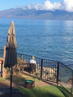 Cute bench on the water. Stairs right into the sand.