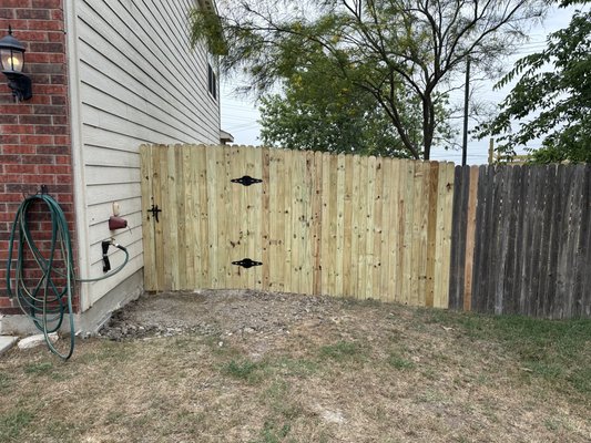 Finished fence with gate door