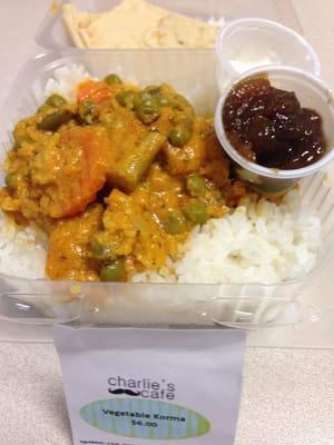 Vegetable Korma with a side of chutney and yogurt