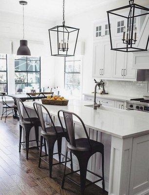 Farm House chairs and modern marble kitchen.