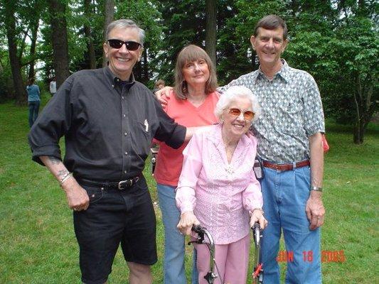 I'm the one in red with my mom & brothers at a reunion.