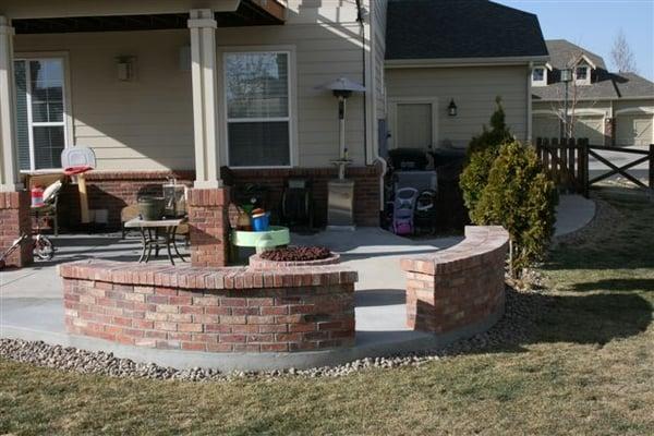 Concrete patio, firepit and seat walls