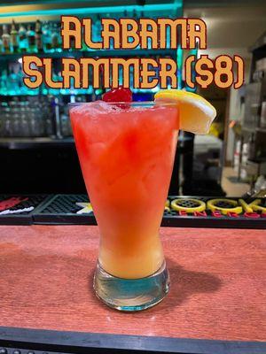 One of our August month specials with Southern Comfort, sloe gin, amaretto, and OJ.