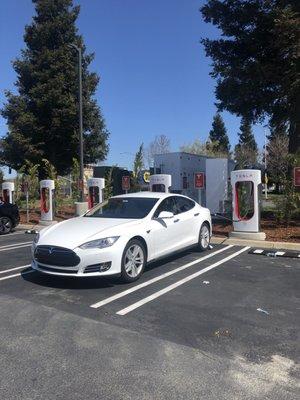 Charging my Tesla while I go grocery shopping!