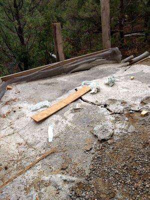 The mess they left us Part Three They built this retaining wall and then poured heavy concrete leftovers on top of dirt not packed down.