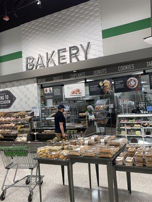 Bakery is in the back of the store