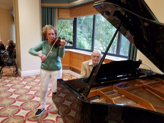 My FIL and one of the residence's (on the violin)