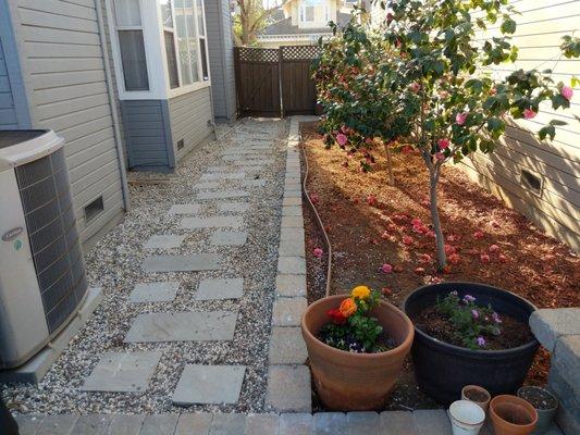 Before: stepping stones and pea gravel path