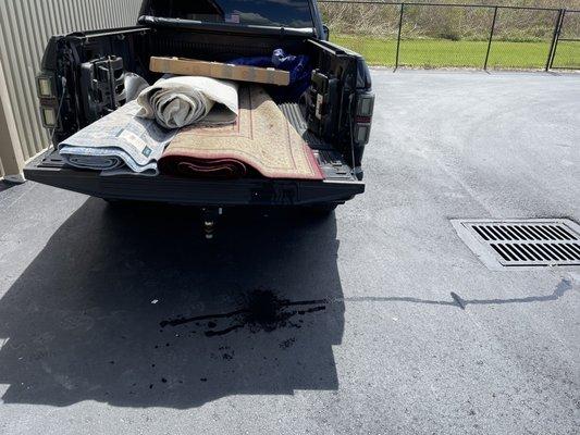 Pickup laden with wet items.