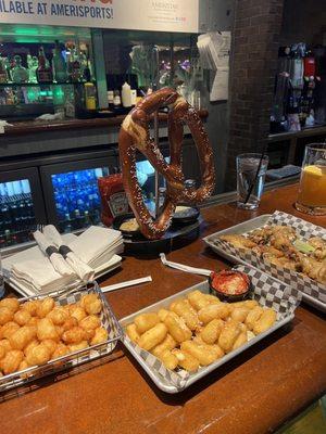 Jumbo pretzel, tater tots, cheese curds, chicken wings