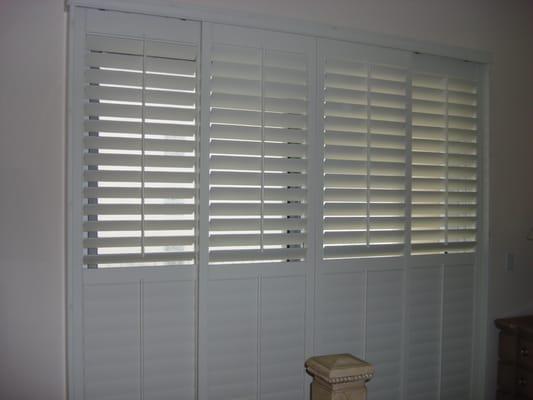 Beautiful plantation shutters look great on slider doors