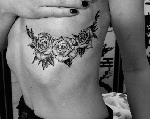 Rose underboob tattoo