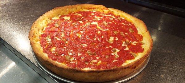 Build your own or Specialty Deep Space Collection Deep Dish Pizza for you to choose from